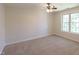 Bedroom with carpet and window providing natural light at 227 Shalimar Dr, Durham, NC 27713