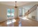 Inviting entryway with staircase featuring hardwood floors and plenty of natural light at 227 Shalimar Dr, Durham, NC 27713