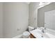 Half bath with vanity, mirror, and neutral color paint at 2409 Horizon Hike Ct, Raleigh, NC 27603