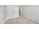 Neutral bedroom with carpet flooring and closet with double doors at 2409 Horizon Hike Ct, Raleigh, NC 27603