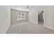 Neutral bedroom with carpet, ceiling fan and natural light at 2409 Horizon Hike Ct, Raleigh, NC 27603