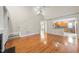 Spacious living room opens to the kitchen with hardwood floors at 2409 Horizon Hike Ct, Raleigh, NC 27603