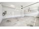 Spacious garage with EV charger, door to interior, and garage door openers at 254 Arlie Ln, Lillington, NC 27546