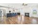 Open-concept kitchen and living room, perfect for entertaining, with hardwood flooring throughout at 254 Arlie Ln, Lillington, NC 27546