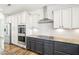 Stylish kitchen features granite countertops, stainless appliances, and ample cabinet space at 254 Arlie Ln, Lillington, NC 27546