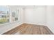 Bright room with a large window and hardwood style floors at 254 Arlie Ln, Lillington, NC 27546