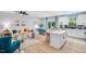 Open concept living space featuring modern kitchen, comfortable living room, and dining area with natural light at 2724 Sammish Way, Raleigh, NC 27616