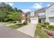 Charming townhome featuring well-maintained landscaping, private entrances, and attached garages at 285 Plaza Dr # C, Chapel Hill, NC 27517