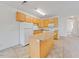 Well-lit kitchen area with a functional island and appliances at 285 Plaza Dr # C, Chapel Hill, NC 27517