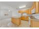 Bright kitchen with ample cabinets, island, and white appliances at 285 Plaza Dr # C, Chapel Hill, NC 27517