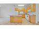 Functional kitchen with center island, perfect for meal preparation at 285 Plaza Dr # C, Chapel Hill, NC 27517