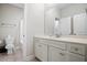 Spacious bathroom featuring a well-lit vanity, toilet, and a shower/tub at 286 Harrison Pond Dr, Pittsboro, NC 27312