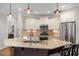 Gourmet kitchen with stainless steel appliances, granite countertops, and center island is perfect for cooking at 286 Harrison Pond Dr, Pittsboro, NC 27312