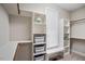 Spacious walk-in closet with custom shelving, hanging rods, and ample storage space at 286 Harrison Pond Dr, Pittsboro, NC 27312