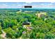Aerial view of the property at 2975 Carolyn Dr in Durham, NC, with lush greenery and nearby amenities at 2975 Carolyn Dr, Durham, NC 27703