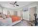Bedroom with ensuite bathroom and ceiling fan and natural light at 2975 Carolyn Dr, Durham, NC 27703