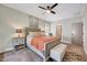 Bedroom featuring an ensuite bathroom, a ceiling fan, and natural light at 2975 Carolyn Dr, Durham, NC 27703