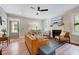 Inviting living room boasts a fireplace, stylish furnishings, and plenty of natural light at 2975 Carolyn Dr, Durham, NC 27703