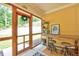 Cozy sunroom featuring a seating area and natural light at 2975 Carolyn Dr, Durham, NC 27703