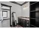 En suite bathroom with dual sinks and granite countertops, plus a walk-in closet at 318 W Lillington St, Angier, NC 27501