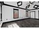Open bedroom with recessed lights, tiled floors, and a window at 318 W Lillington St, Angier, NC 27501