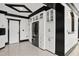 A charming kitchen with stainless steel appliances and custom cabinets at 318 W Lillington St, Angier, NC 27501