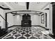 Bright living room showcases a modern fireplace, designer black and white accents, and stylish architectural details at 318 W Lillington St, Angier, NC 27501