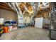 Unfinished basement featuring insulation, an HVAC unit, and concrete floors at 386 Monteith Dr, Chapel Hill, NC 27516