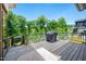Outdoor deck with grill and outdoor furniture, perfect for grilling and views at 386 Monteith Dr, Chapel Hill, NC 27516