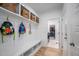 Well-organized mudroom with storage, bench and access to laundry room at 386 Monteith Dr, Chapel Hill, NC 27516