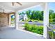 Spacious porch with black railing offering neighborhood views at 386 Monteith Dr, Chapel Hill, NC 27516