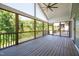 Spacious screened porch with beautiful views and wooden floors at 386 Monteith Dr, Chapel Hill, NC 27516