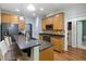 Well-equipped kitchen with granite countertops, stainless steel appliances, and ample cabinet space at 395 Timberlands Dr, Louisburg, NC 27549