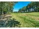 Exterior view of lush green lawn in the backyard at 403 Rutherglen Dr, Cary, NC 27511