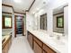 Well-lit bathroom with double sinks, lots of counter space and separate tub at 403 Rutherglen Dr, Cary, NC 27511