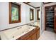 Bathtub near large window and adjacent to walk in closet at 403 Rutherglen Dr, Cary, NC 27511