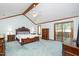 Spacious bedroom with a vaulted ceiling, wood beams and balcony access at 403 Rutherglen Dr, Cary, NC 27511