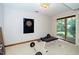 Exercise room with sliding glass doors offering backyard views at 403 Rutherglen Dr, Cary, NC 27511