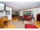 Bright living room with hardwood floors, large windows, and an open layout at 403 Rutherglen Dr, Cary, NC 27511