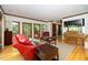 Spacious living room with hardwood floors, natural light, and an open concept design at 403 Rutherglen Dr, Cary, NC 27511