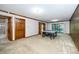 Recreation room with a ping pong table and sliding glass door at 403 Rutherglen Dr, Cary, NC 27511