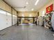 Spacious garage featuring high ceilings, a car lift, and ample storage space at 410 Mountain Laurel, Chapel Hill, NC 27517