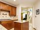 Kitchen featuring stainless steel appliances, granite countertop, gas range and center island at 410 Mountain Laurel, Chapel Hill, NC 27517