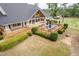 Aerial view of a patio with dark wood and blue umbrellas, showcasing outdoor amenities at 410 Mountain Laurel, Chapel Hill, NC 27517