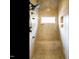 Tiled shower features shower head and built in bench at 410 Mountain Laurel, Chapel Hill, NC 27517