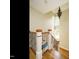 Elegant staircase with decorative wrought iron railings and hardwood steps at 410 Mountain Laurel, Chapel Hill, NC 27517