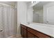 Bathroom vanity with double sinks, ample countertop space, and dark wood cabinets at 44 Bordeaux Dr, Clayton, NC 27527