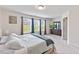 Spacious bedroom with natural lighting, soft carpet, and large windows at 44 Bordeaux Dr, Clayton, NC 27527