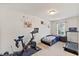 bedroom featuring a car bed, fitness equipment and butterfly wall decorations at 44 Bordeaux Dr, Clayton, NC 27527