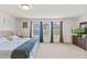 Large bedroom with carpet, natural light, and furniture at 44 Bordeaux Dr, Clayton, NC 27527